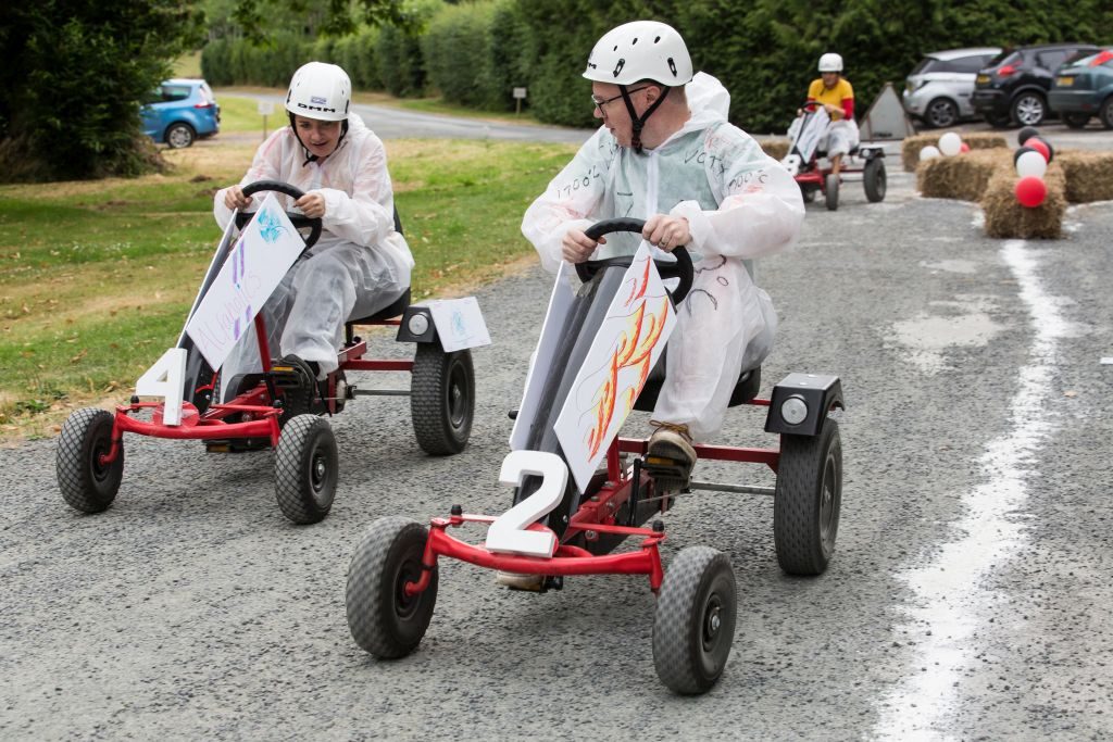 Go-kart racing and hay bales